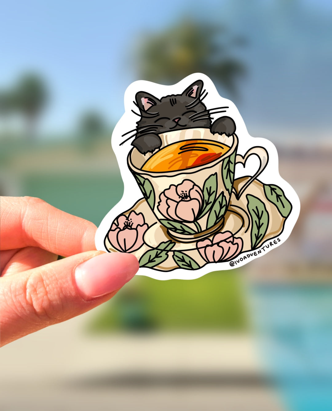 Naklejka - Kotka z herbatą w kwiatowej filiżance